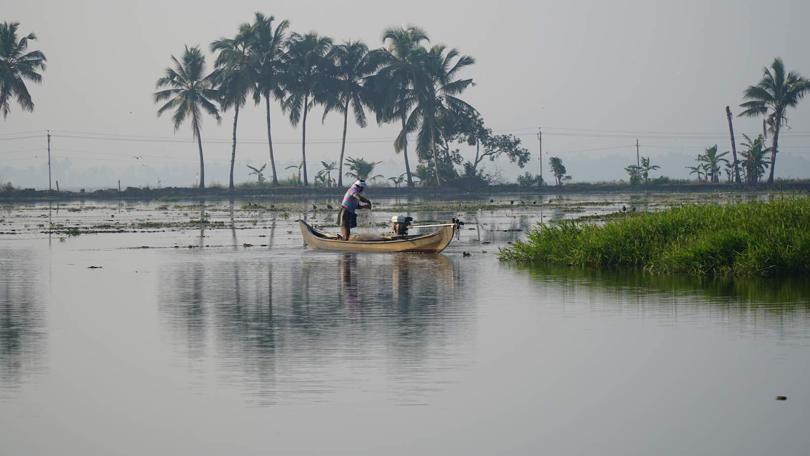 As we went I saw people getting up from their houses along the river/lakes and begin their day fishing or farming.